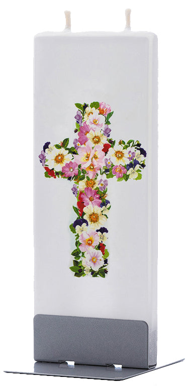croce floreale colorata disegnata sulla candela Flatyz